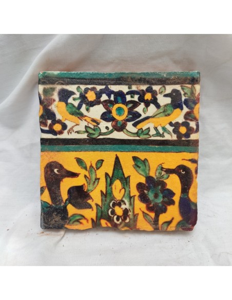 Azulejo árabe cenefa amarilla pájaros